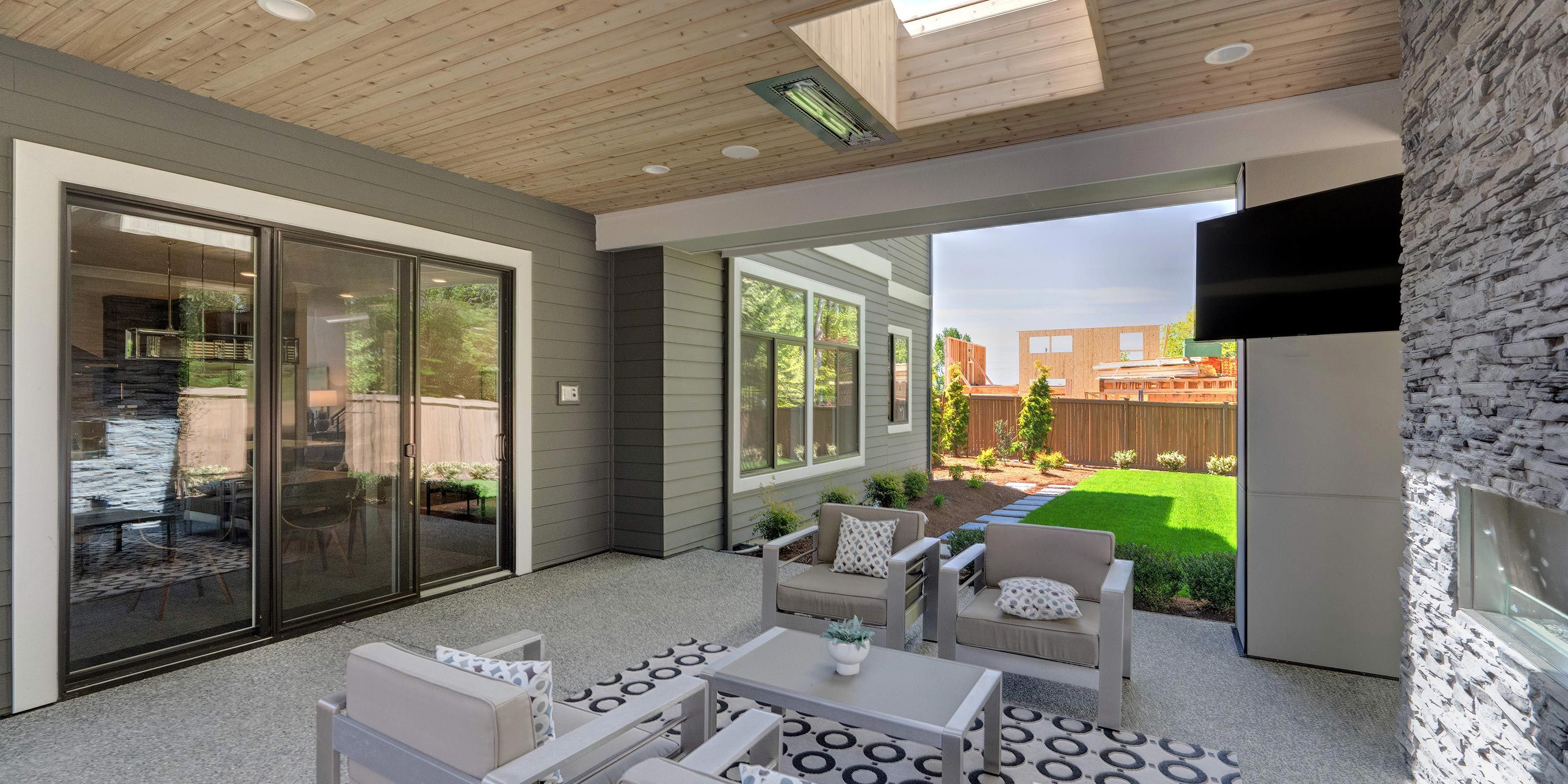 patio with TV technology and outdoor lighting